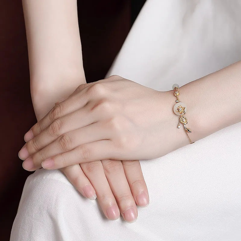 Hetian jade lotus peace buckle silver bracelet for women with retro antique style