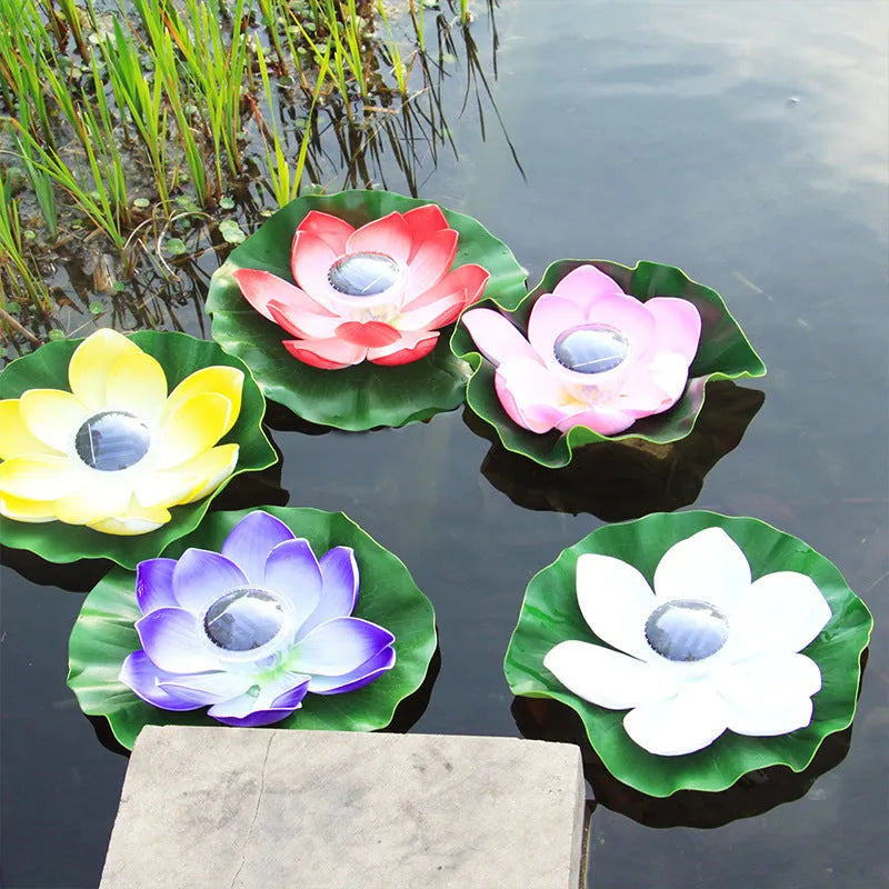 Floating solar lotus lamp on pond water with colourful LED light