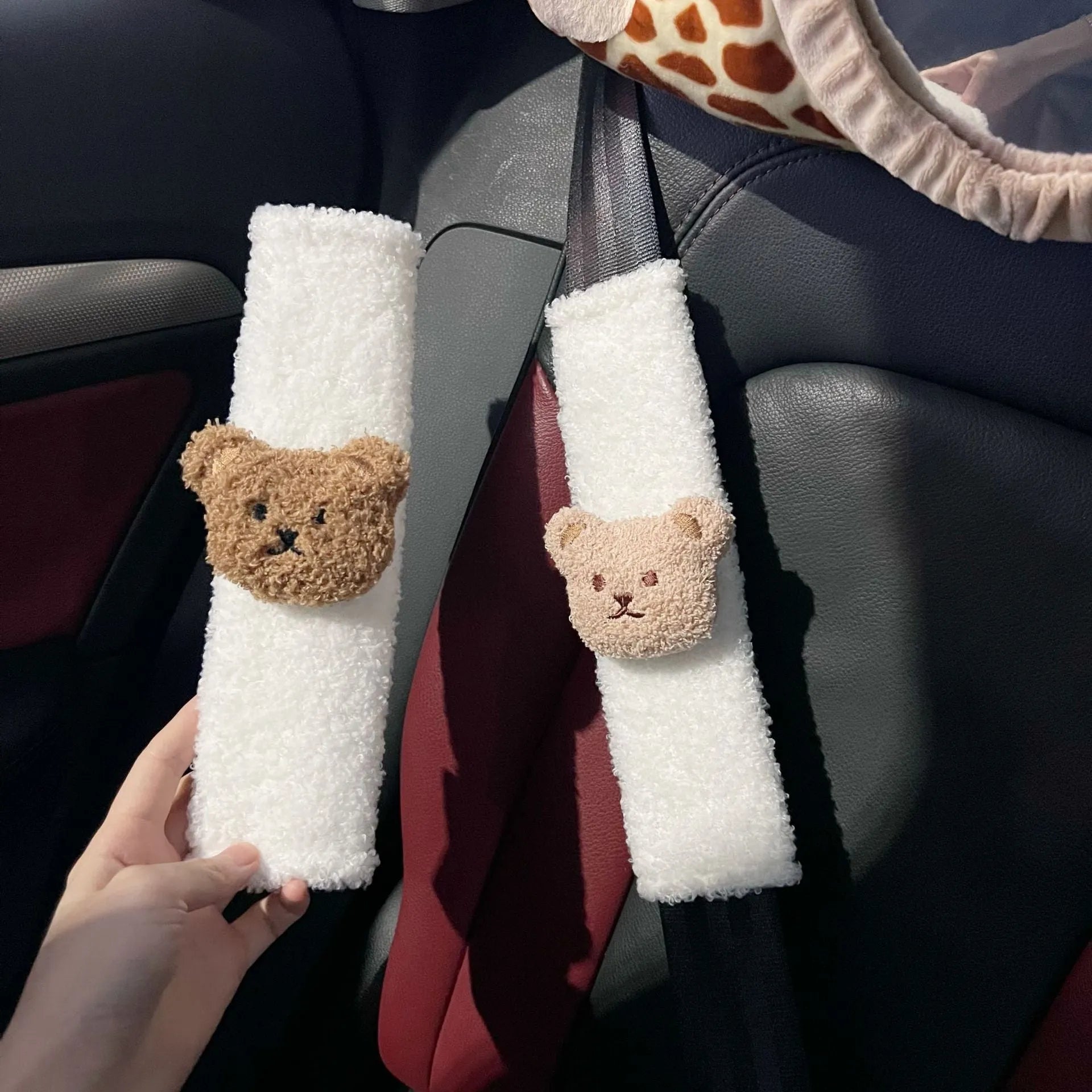 Cartoon bear plush seat belt shoulder cover for child car safety measuring 25cm by 6.5cm by 5cm.