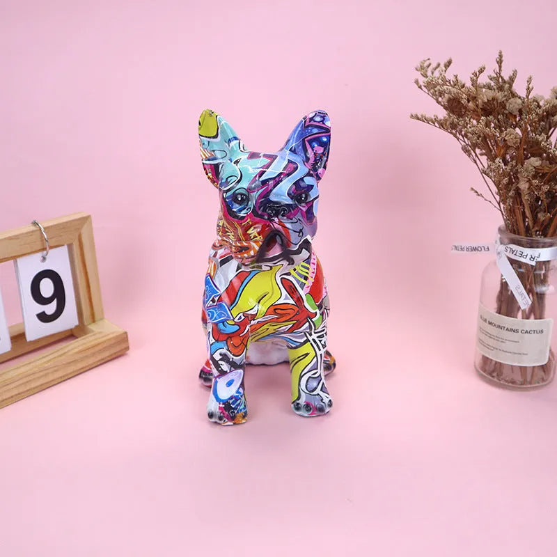 Graffiti-coloured French bulldog resin statue on a shelf, showing modern simple style.