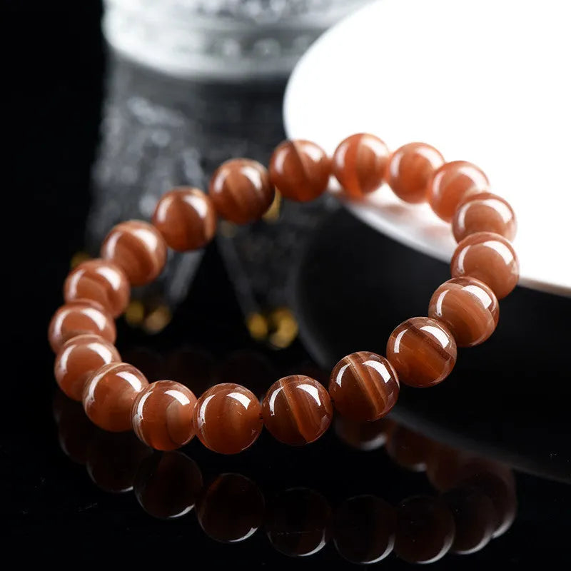 Natural rhodochrosite mineral bracelet with geometric beads in old mine colour