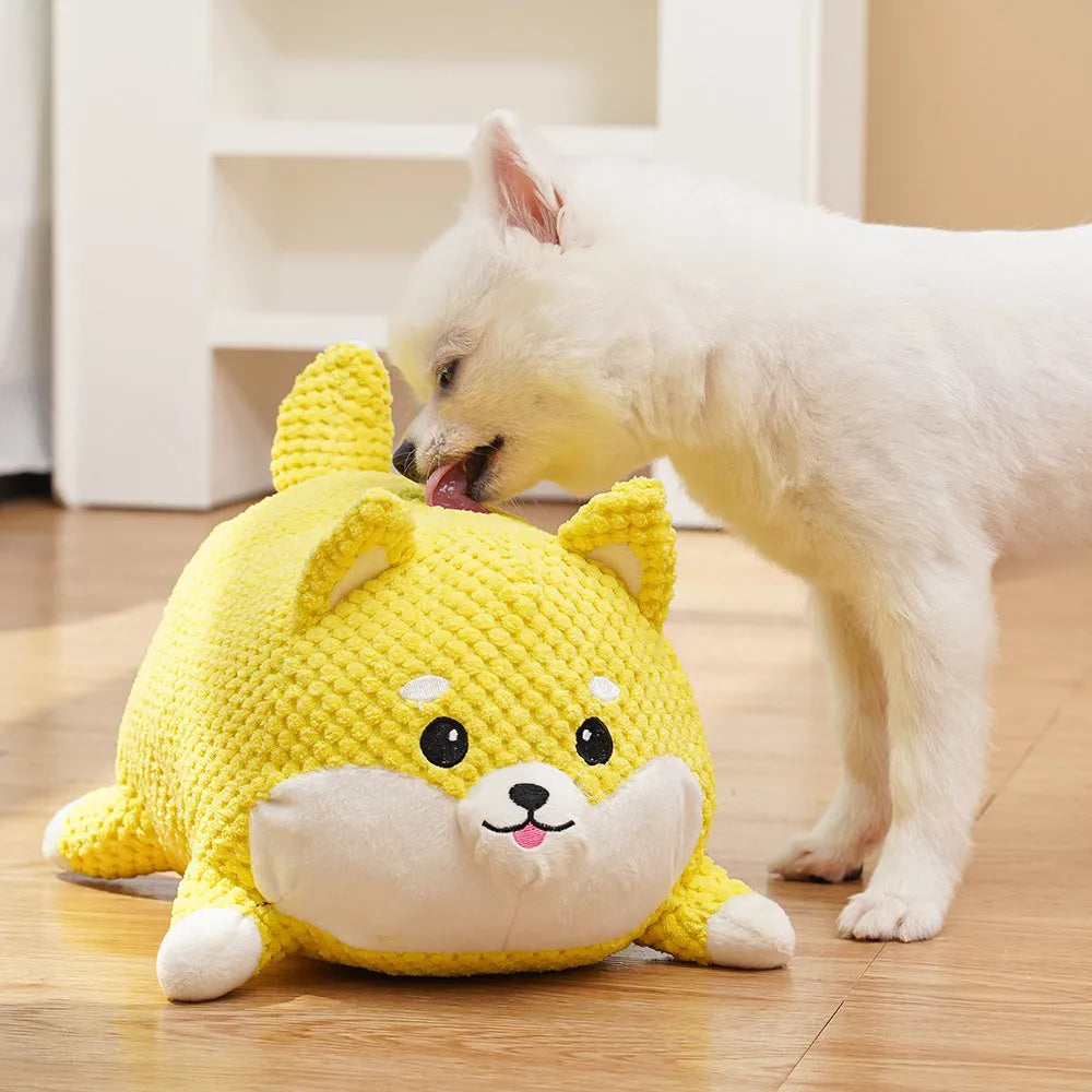Large and medium sized plush calming dog toy with squeaker and textured chew fabric.