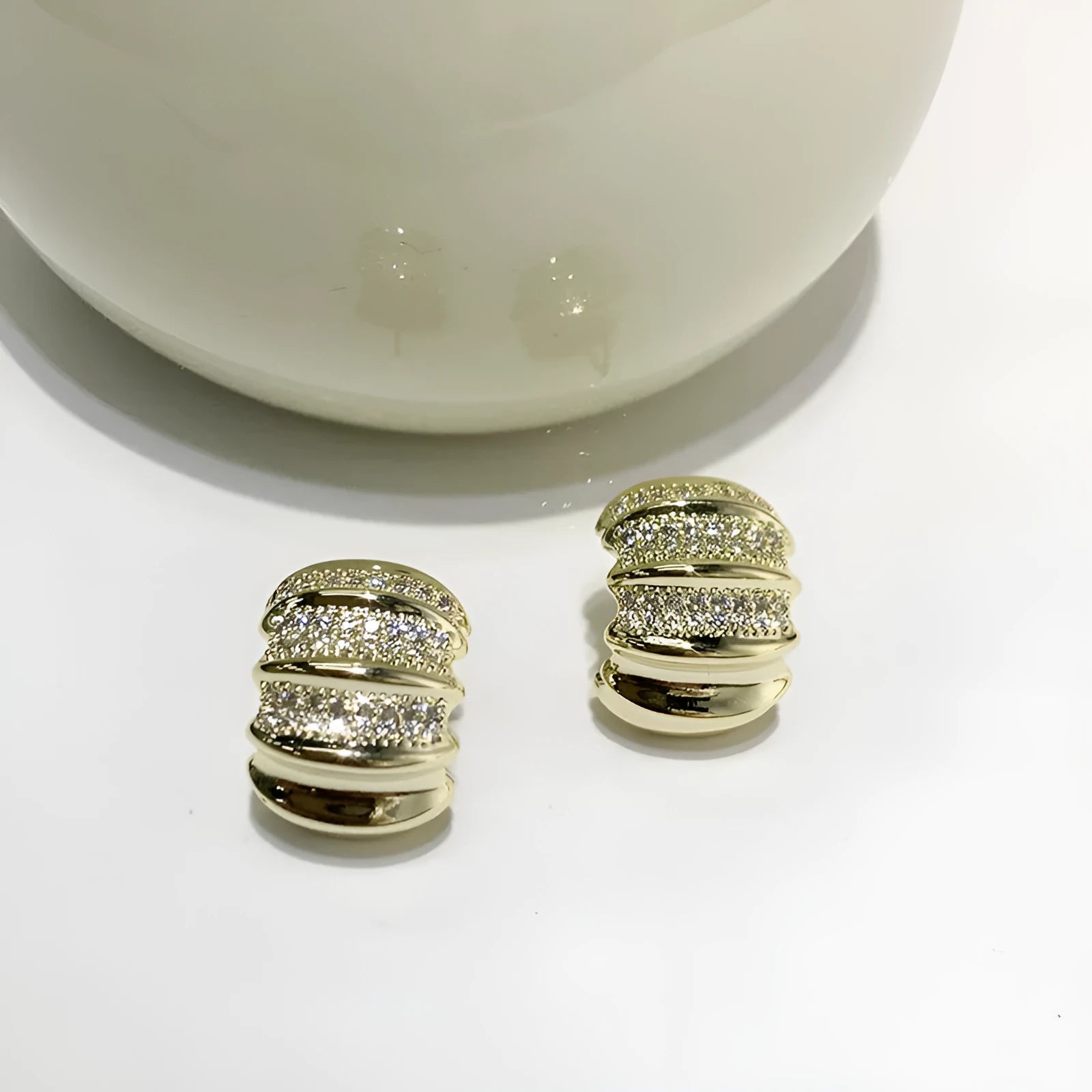 Minimally irregular geometric metal stud earrings in silver finish with 2.5cm drop