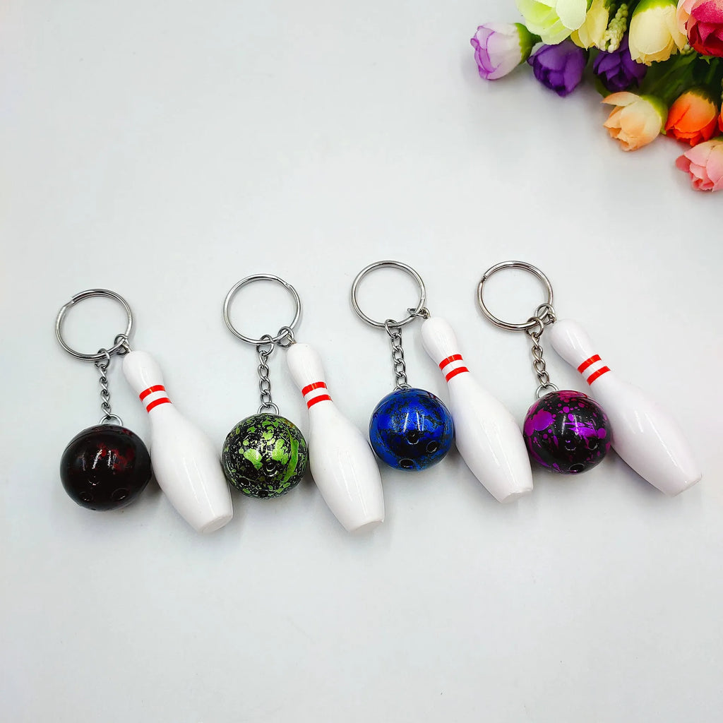 Mini bowling ball keychain pendant in dark red, blue, purple or green colour on keyring