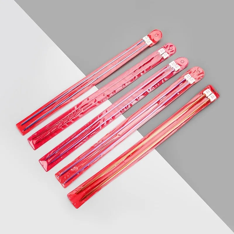 Set of lengthened crochet hooks with protective end caps in multiple sizes from 2.0mm to 10.0mm.