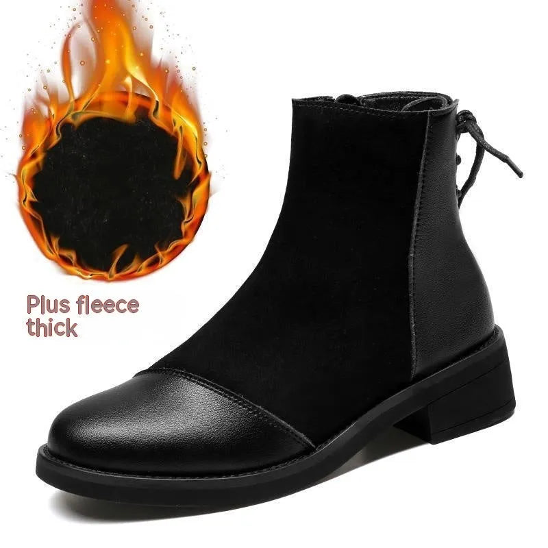 Black women's knee-high Martin boots with side zip, round toe, and chunky heel on a non-slip rubber sole.
