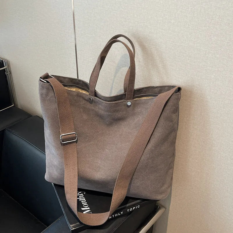 Large capacity women's casual tote bag in khaki cloth with polyester lining, sandwich pocket, and mobile phone bag