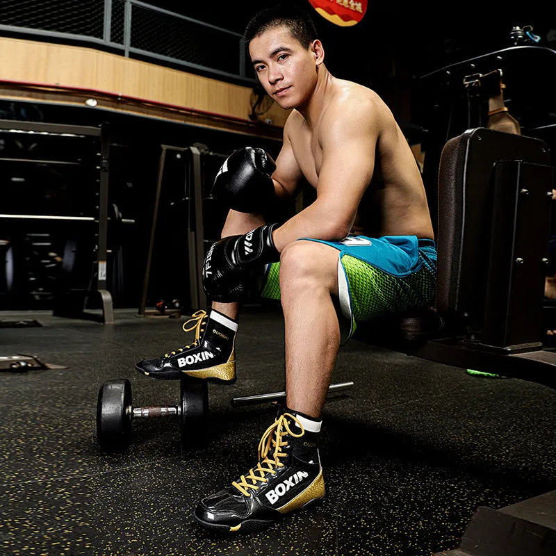 Mixed combat high top training shoes in green with mesh and leather panels and a soft rubber sole.