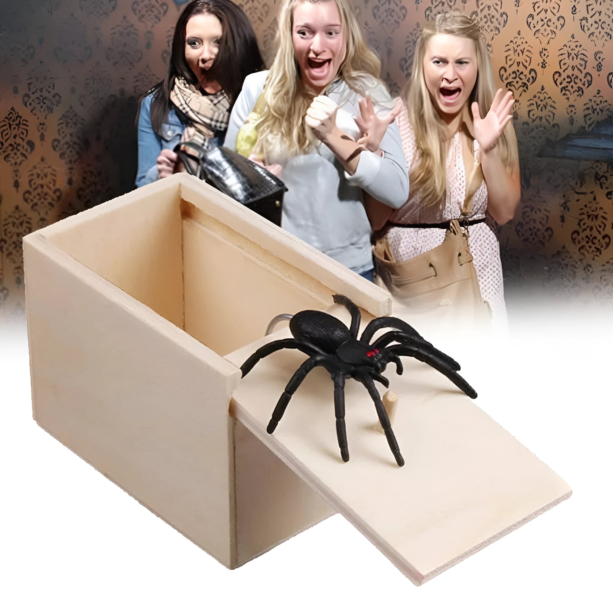 Wooden prank scare box open showing a lifelike spider figurine on a spring, next to the box lid.