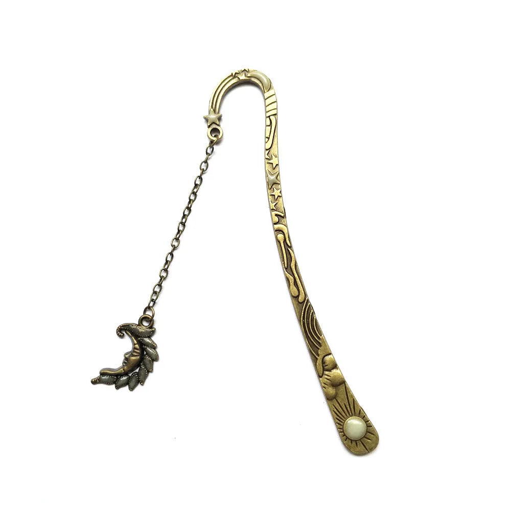 Retro five-pointed star glowing metal bookmark in ancient silver and bronze colours with celestial patterns