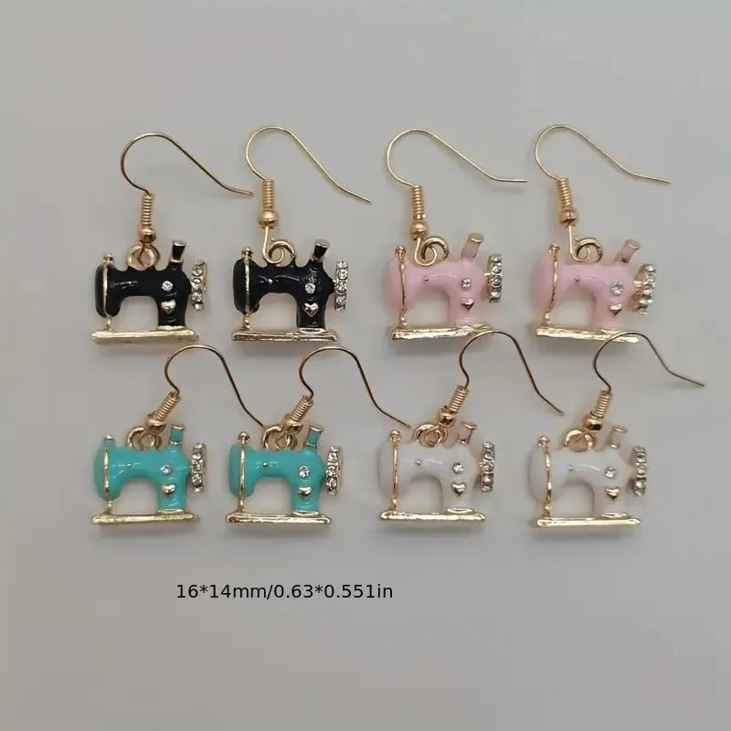 Pair of alloy vintage sewing machine earrings with oil drip finish in black colour
