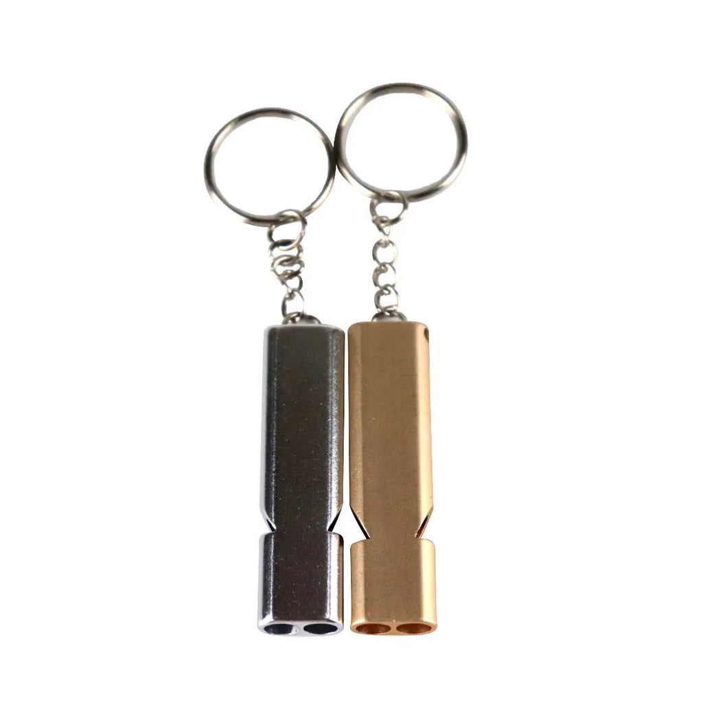 Silver and gold aluminium alloy outdoor survival whistle with double hole design.