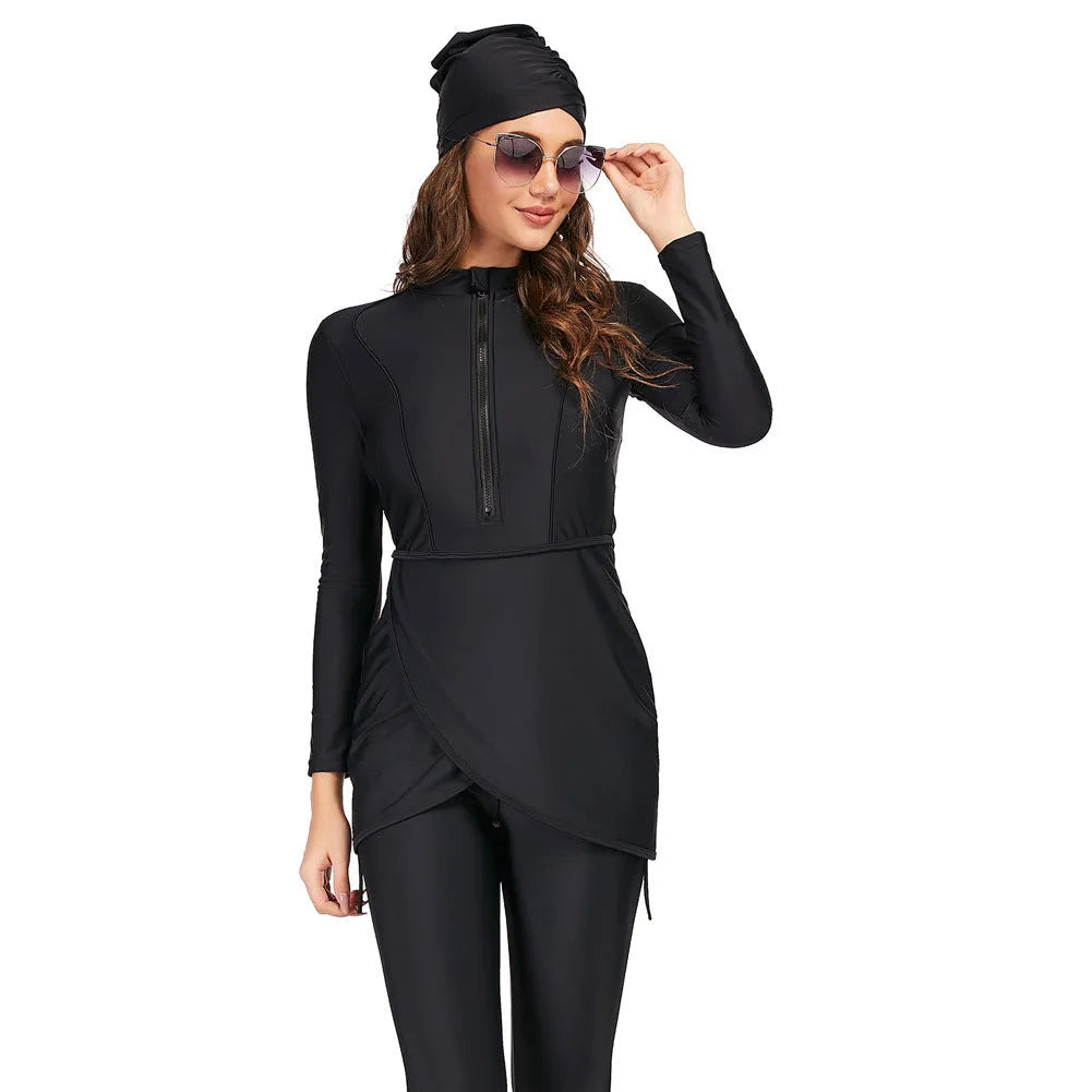 Black conservative long sleeve swimsuit for women with full coverage and skirt bottom option.