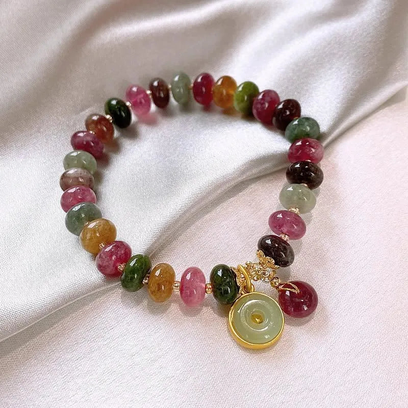 Handmade colourful tourmaline abacus bead bracelet with geometric rabbit pendant