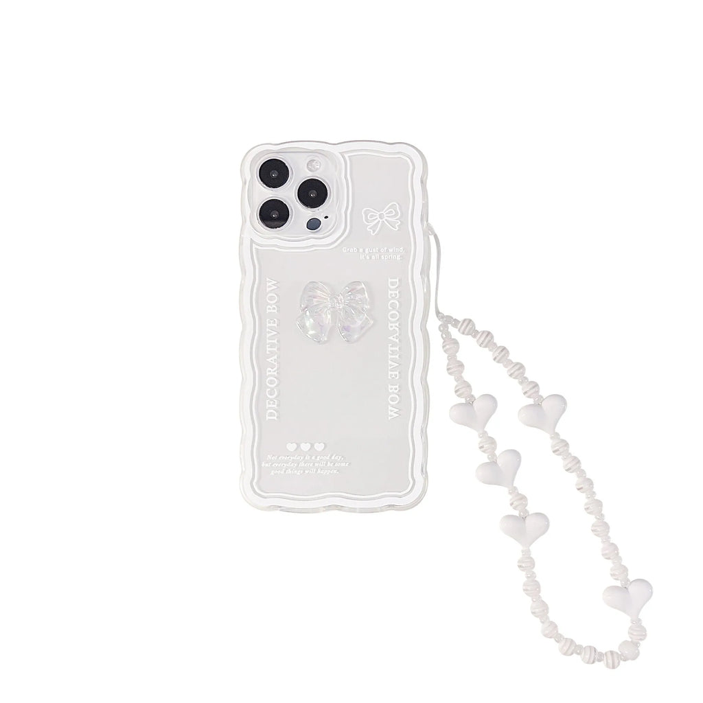 Transparent iPhone case with a raised 3D ice-through bow design on the back.