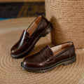 Round head low heel leather shoes for women in vintage brown, side view showing shallow mouth and low heel