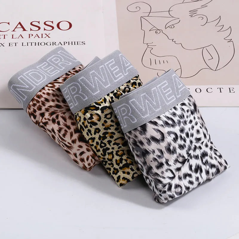 Men's leopard print underwear in polyester fabric with mid-waist design for large sizes