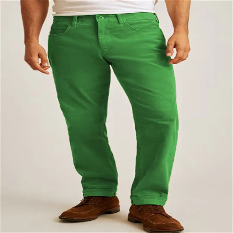 Loose fit solid green corduroy casual straight leg trousers on a mid-waist.