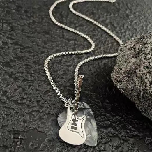 Black guitar pendant necklace in titanium steel on box chain, lithographic finish, women's punk rock style accessory.
