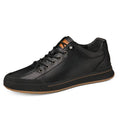 Men's round-toe casual shoes in matte leather, showing flat heel and breathable design on a white background.