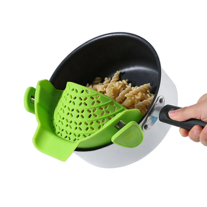 Silicone pot drain stopper kitchen gadget in five colour options on kitchen counter