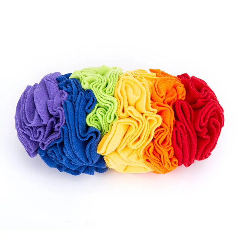 Dog snuffle pad made from polar fleece in rainbow colour, size 25x15cm, with treats hidden in fleece strips