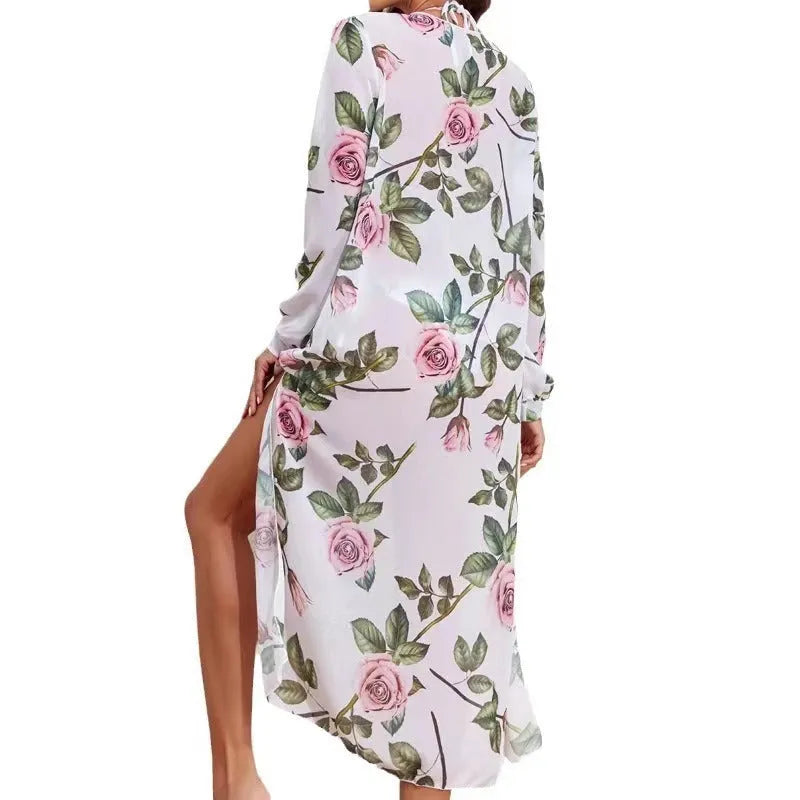 Women's white printed three-piece bikini swimsuit set with matching blouse cover-up on mannequin