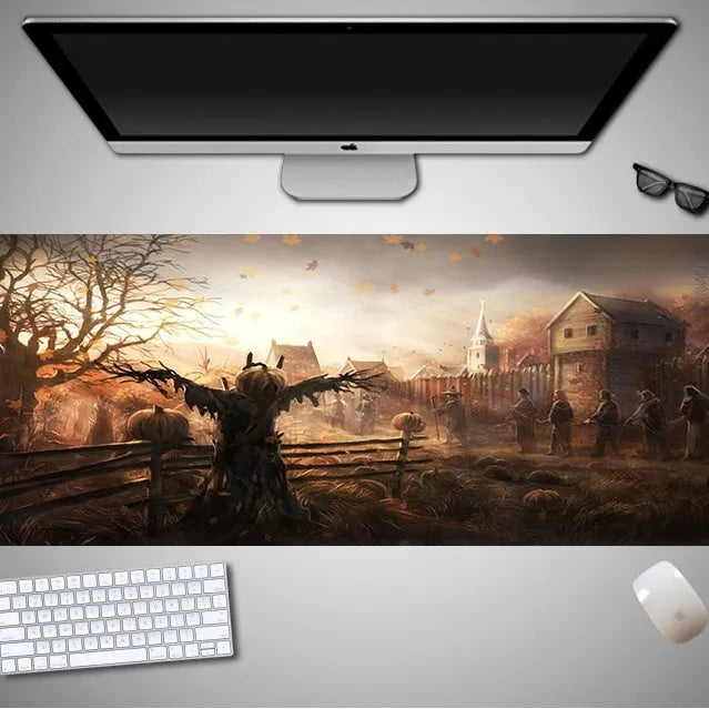 Oversized Halloween pattern rubber cloth mouse pad on a desk with non-slip base.