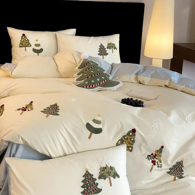 Pure cotton four-piece bedding set with embroidered Christmas tree towel decoration on duvet cover.