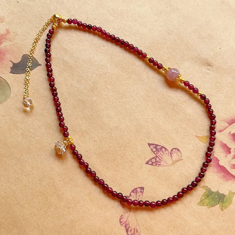 Women's natural garnet bracelet with double ring design and H311 colour stones
