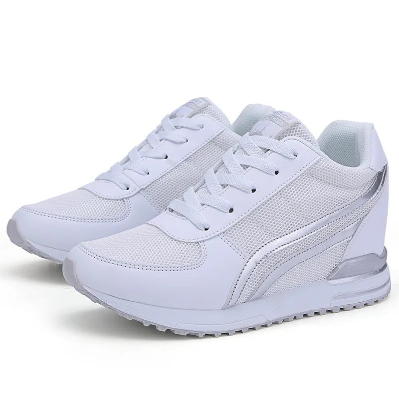 Mesh height increasing casual sneaker in dark blue with front lace-up and low-top design