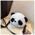 Soft plush cylindrical panda head crossbody bag with a shoulder strap.