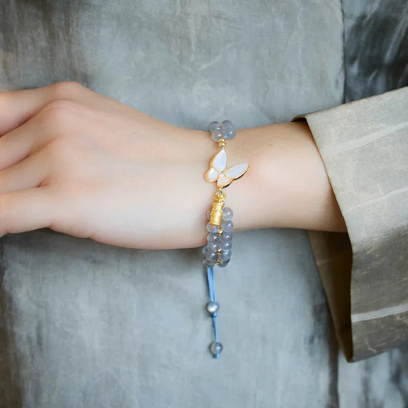 Grey moonstone woven bracelet with butterfly charm for women