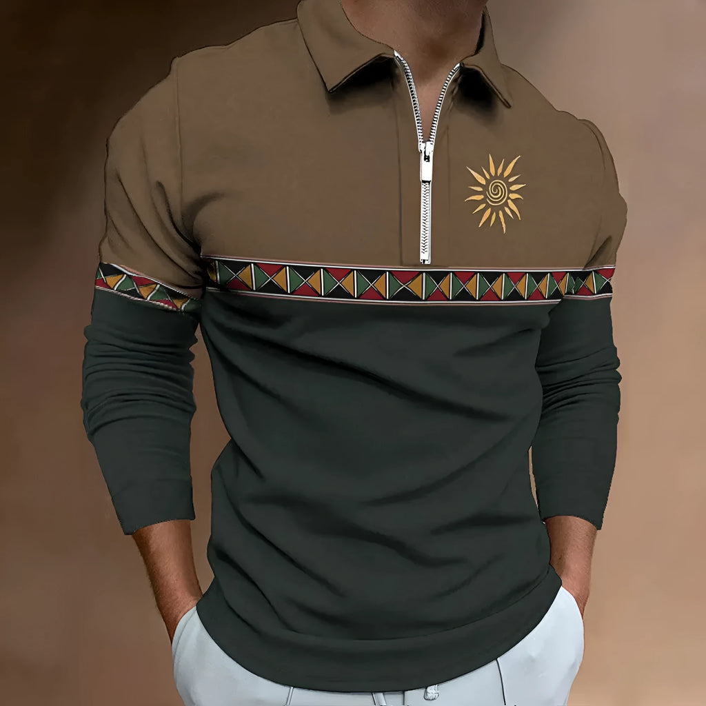 Man wearing a loose-fit long sleeve t-shirt with retro colour printing and zipper details.