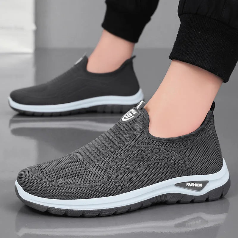 Men's black and grey breathable casual shoes with mesh lining and round toe design