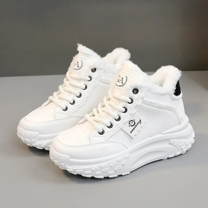 Ladies casual low top sneakers in white with thick rubber sole and round toe