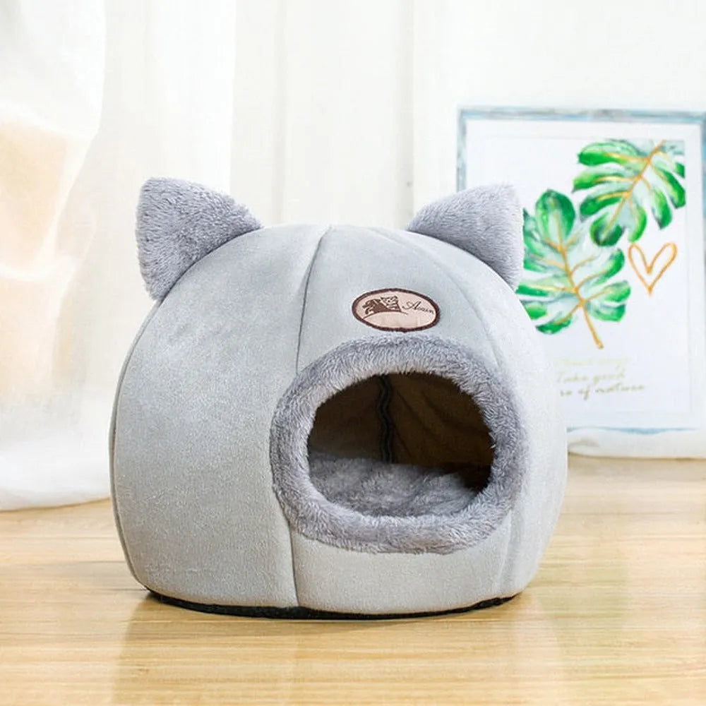 Grey fleece enclosed cube cat bed with entrance hole, shown in small, medium, and large sizes.