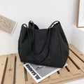 Women's solid colour canvas handbag with double shoulder straps and mobile phone pocket