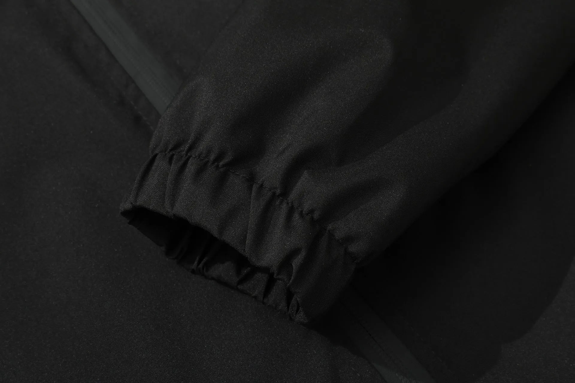 Men's polyester long sleeve outdoor wild jacket in spring and autumn, available in black, grey, and ivory white