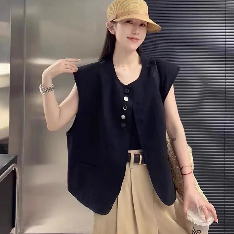 Women's beige loose-fit polyester vest with a pocket, shown on a hanger.