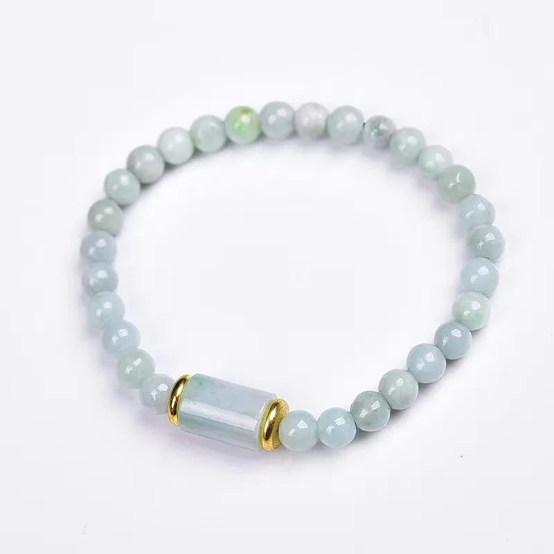 Myanmar Jade round bead bracelet in emerald green with geometric ethnic style design