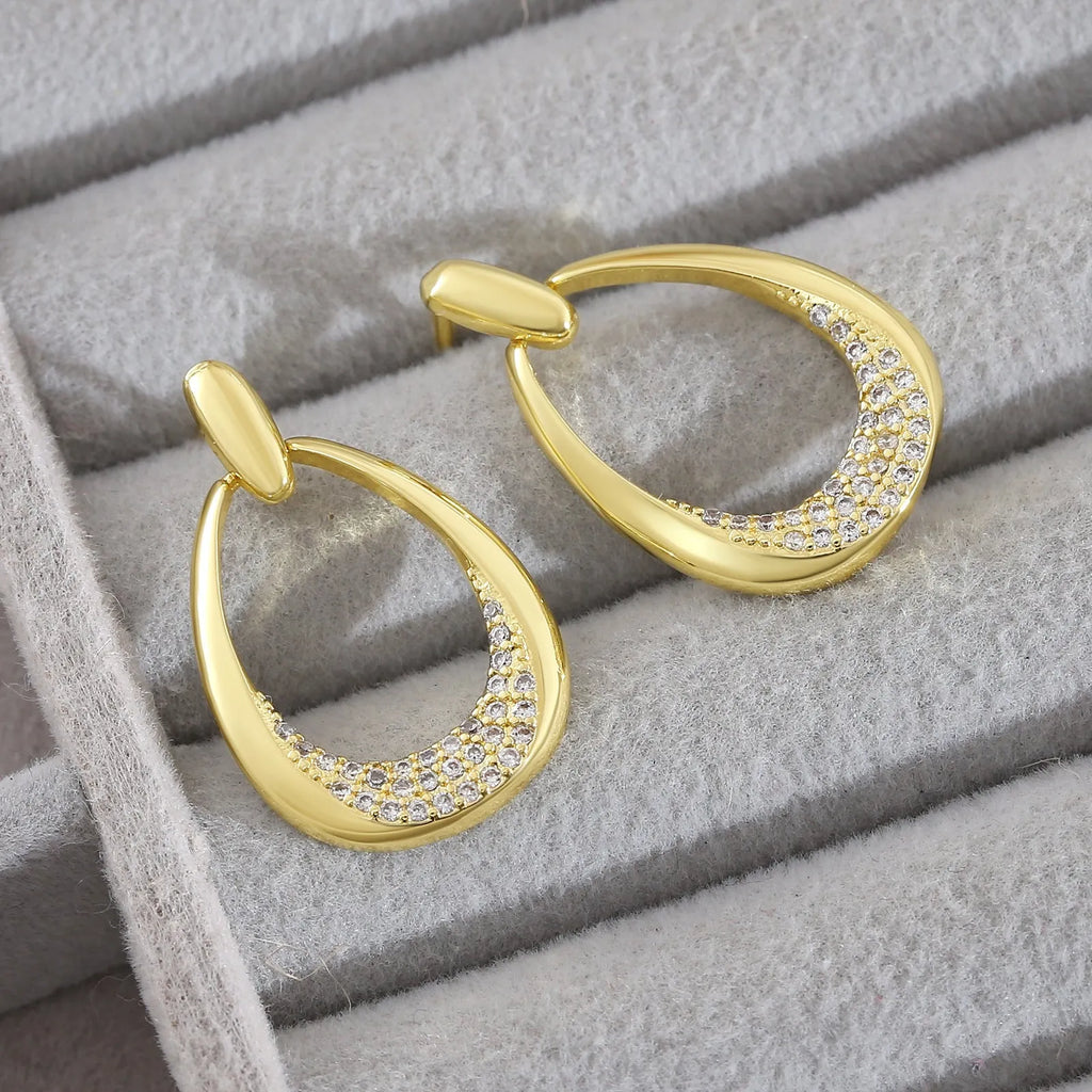 Yellow gold geometric drop earrings for women with ring design, dimensions 2.6cm by 1.7cm.