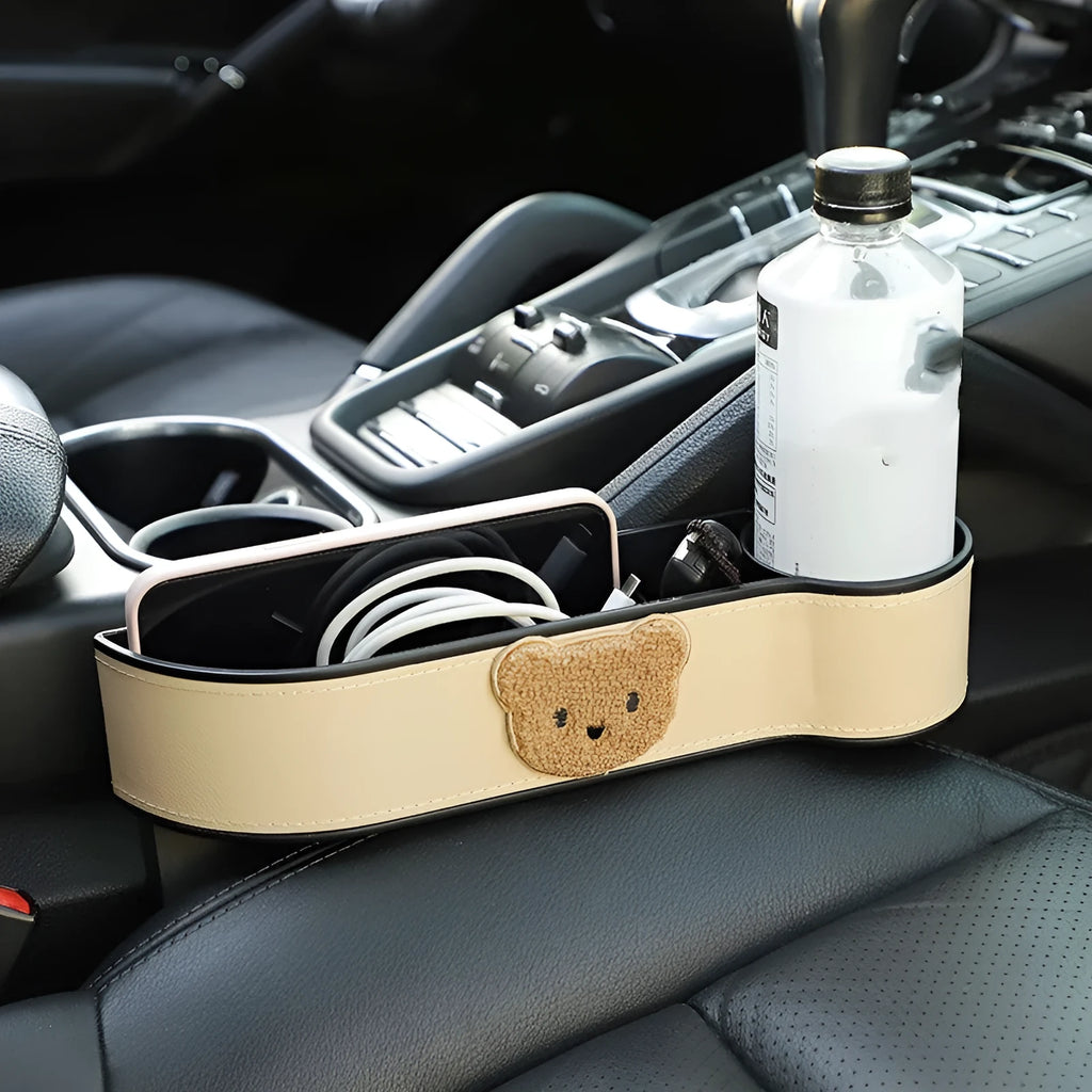 Car seat gap storage box with cartoon bear design in synthetic leather for vehicle organisation