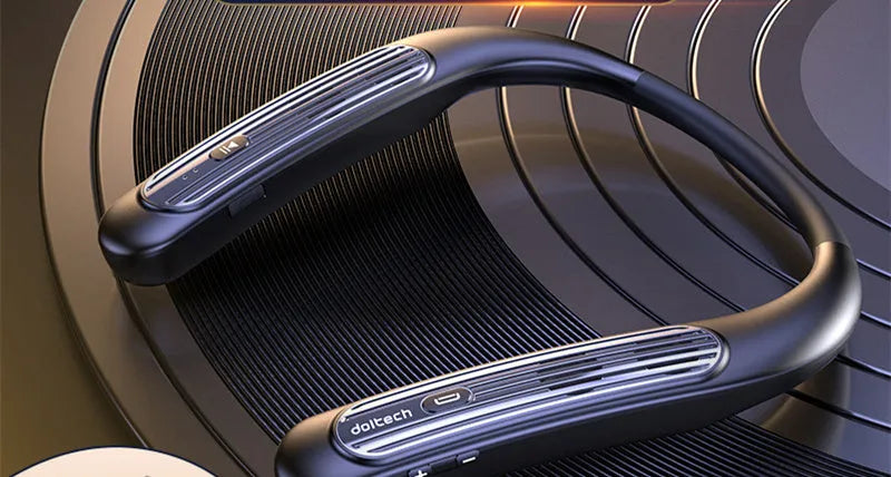 A person wearing a black wireless Bluetooth speaker around their neck for hands-free listening.