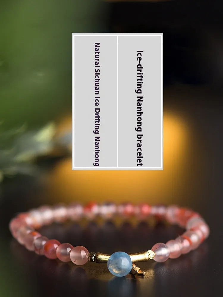 Ice Float Nanhong Agate bracelet with flower shape and bamboo joint details in ethnic style.