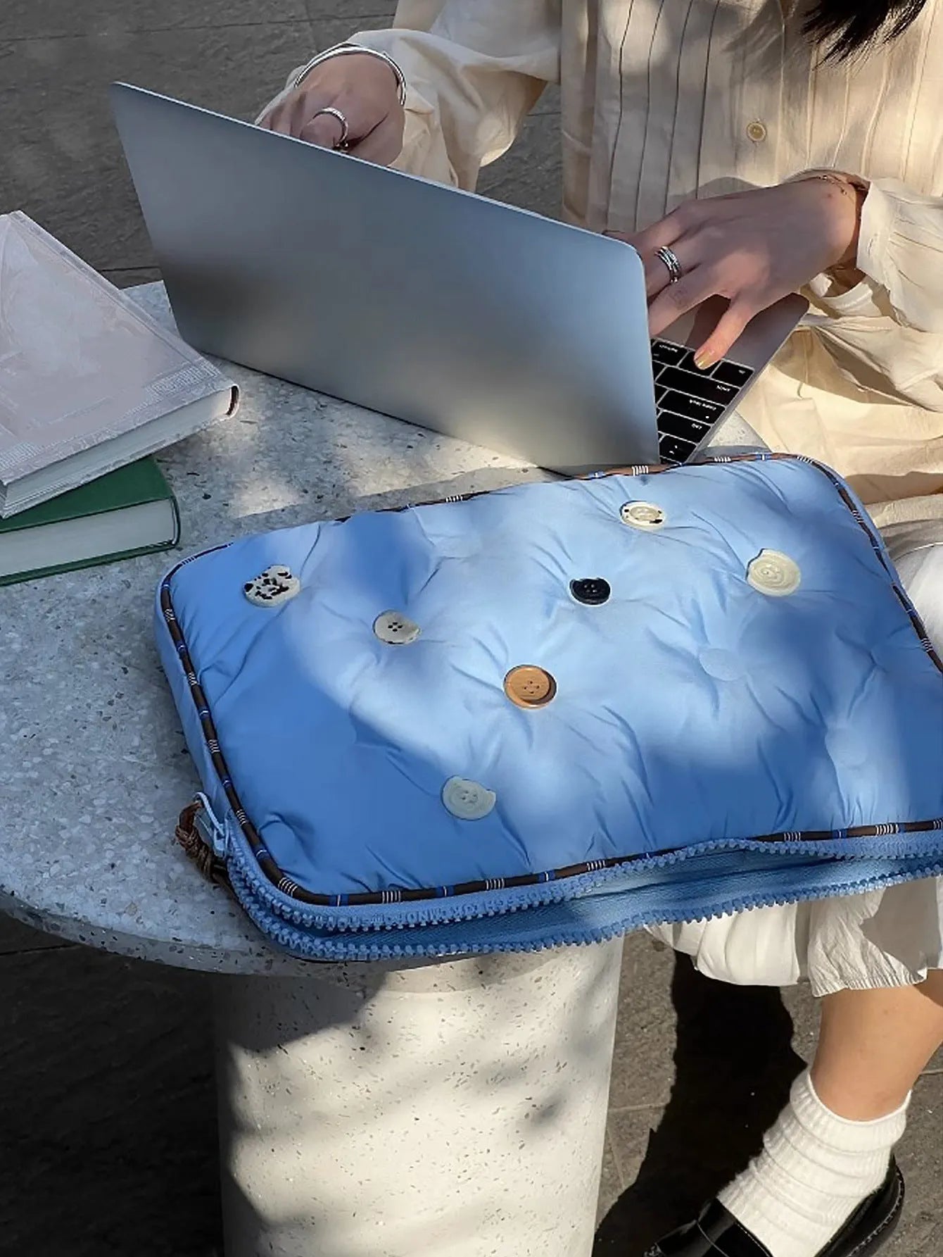 Blue and citrus plaid patterned nylon laptop sleeve for a 14-inch computer