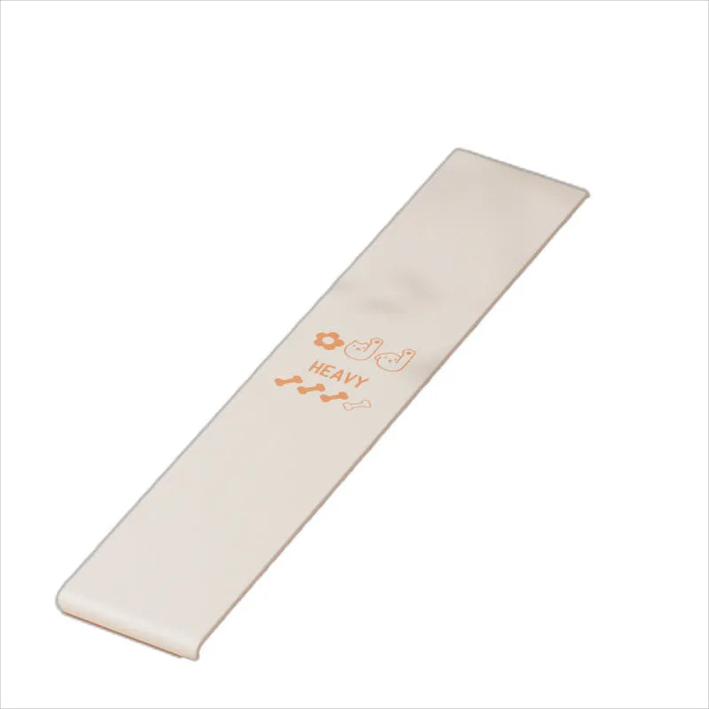 Set of four plastic elastic resistance bands in pink, orange, beige, and green colours, representing different strength levels.