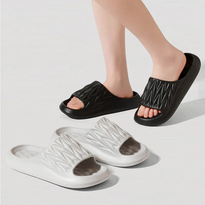 Leaf texture design EVA slippers for men and women in various colours on a white background.