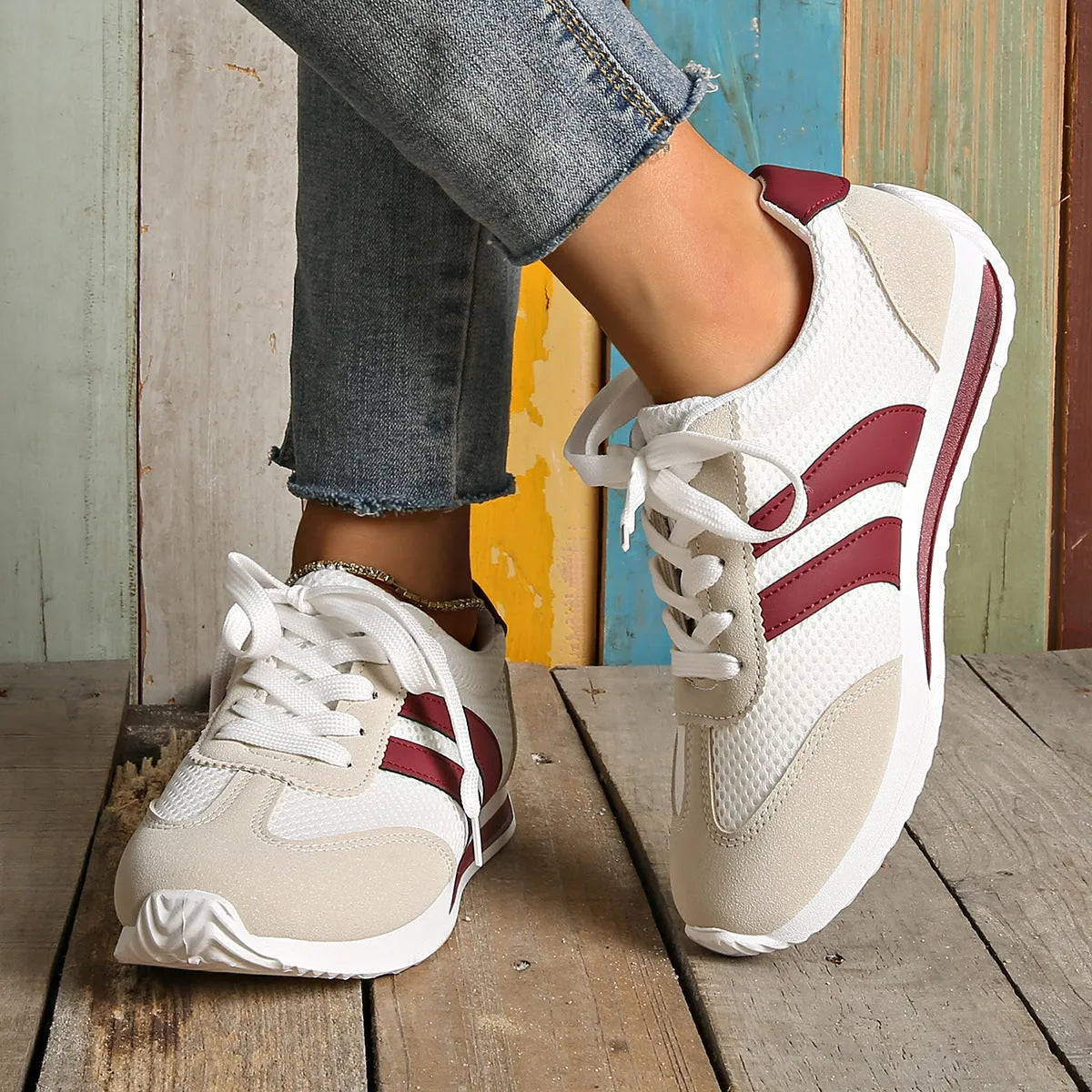 Women's wine red Cortez Retro sneakers with cross strap design and mesh lining