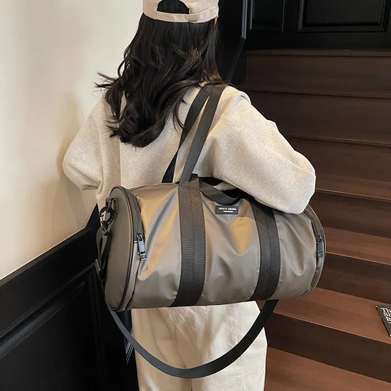 Waterproof Oxford cloth sports handbag in black, dark gold, and dark grey colour options